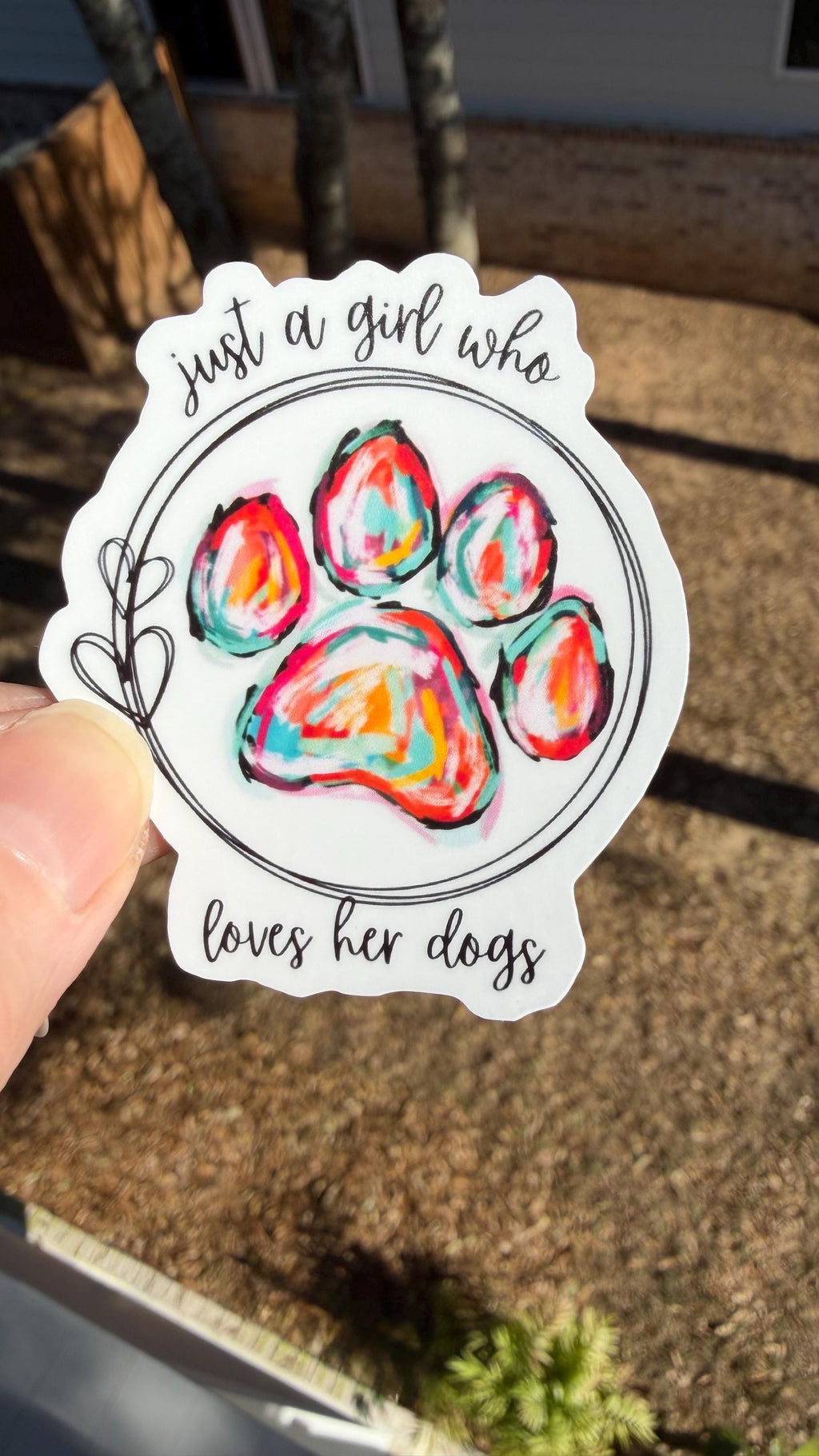 Just a Girl Who Loves Her Dogs Sticker | Colorful Paw Print Vinyl Sticker