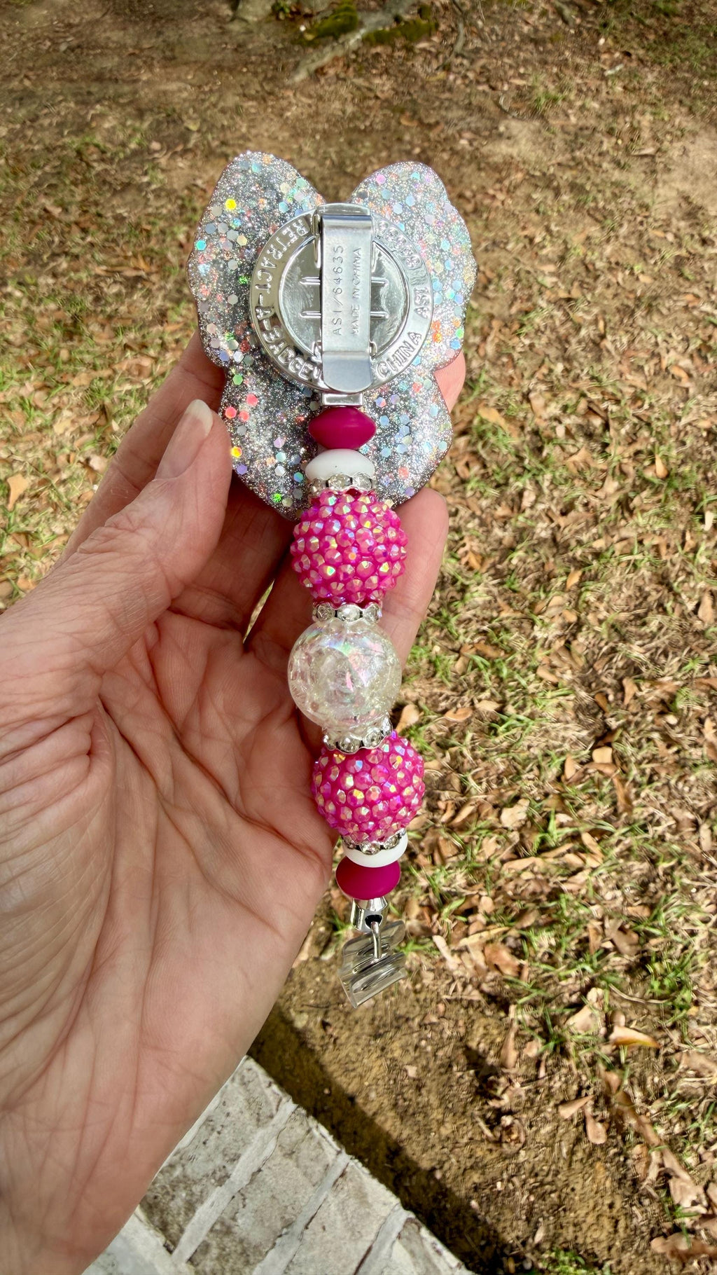 Pink Coquette Bow Badge Reel – Polka Dot Bow with Silver Holographic Background | Interchangeable Topper