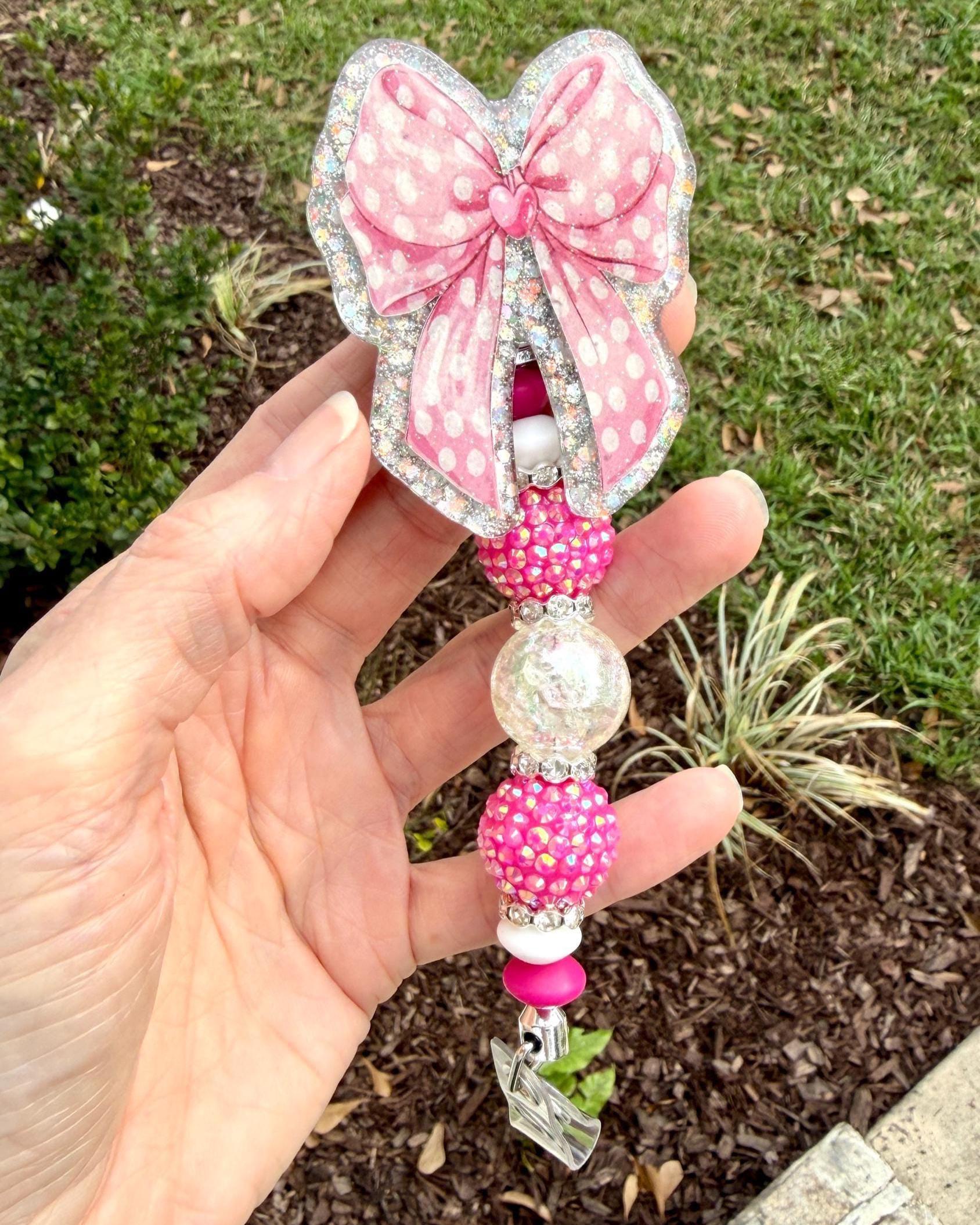 Pink Coquette Bow Badge Reel – Polka Dot Bow with Silver Holographic Background | Interchangeable Topper