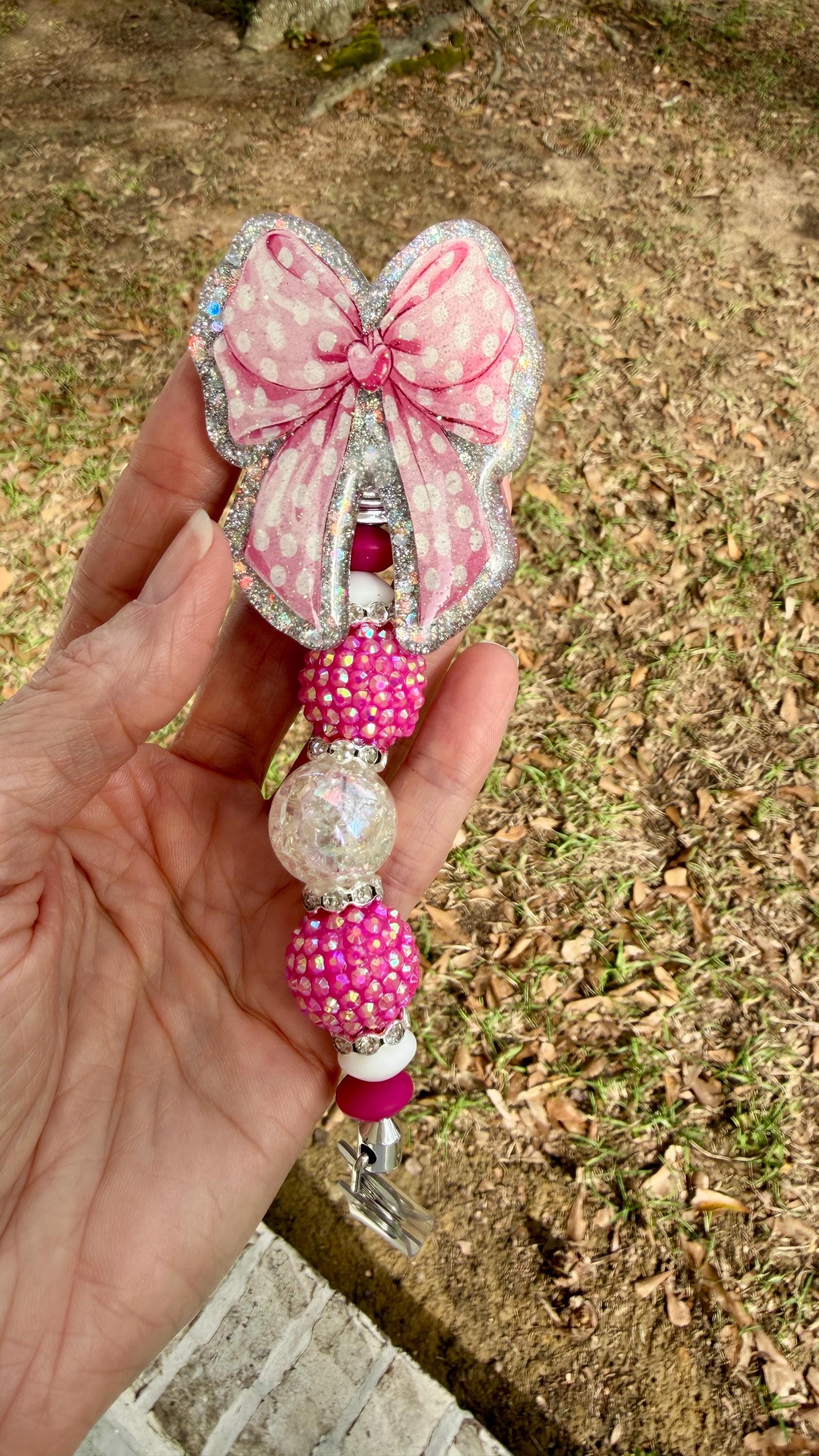 Pink Coquette Bow Badge Reel – Polka Dot Bow with Silver Holographic Background | Interchangeable Topper